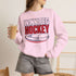 Winnipeg Hockey unisex crewneck sweatshirt featuring vintage navy and red collegiate lettering with a hockey puck graphic, designed by Prairie Life Co.