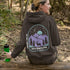 This hoodie features a graphic of a deer standing in the mountains beneath a moonlit sky, everything we love about the quiet magic of the wilderness.