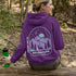 This hoodie features a graphic of a deer standing in the mountains beneath a moonlit sky, everything we love about the quiet magic of the wilderness.