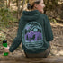 This hoodie features a wolf howling at the moon, rugged mountains, towering pines, and a breathtaking starry sky illuminated by dancing northern lights.