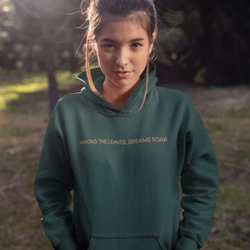Wrap yourself in the charm of nature with our Among the Leaves Hoodie, a wearable piece of folk art that celebrates the harmony of birds, branches, and blooms.