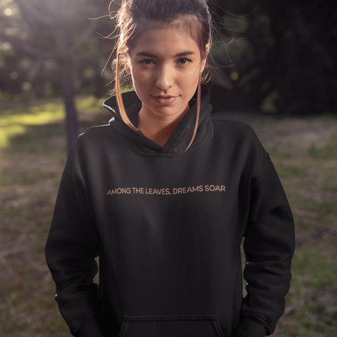 Wrap yourself in the charm of nature with our Among the Leaves Hoodie, a wearable piece of folk art that celebrates the harmony of birds, branches, and blooms.