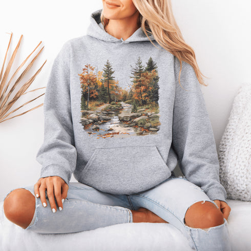 This stunning design features a serene autumn forest scene, complete with vibrant foliage and a peaceful creek winding its way through nature’s splendor.