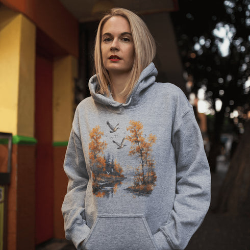 This design captures a stunning autumn forest scene, complete with vibrant golden leaves, a tranquil creek, and graceful geese soaring across the sky.