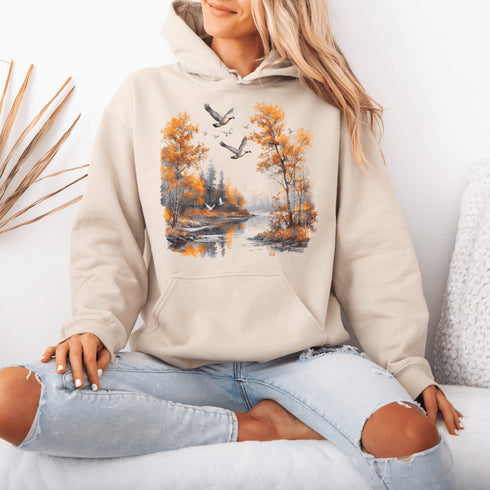 This design captures a stunning autumn forest scene, complete with vibrant golden leaves, a tranquil creek, and graceful geese soaring across the sky.
