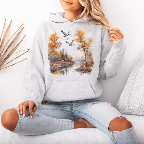 This design captures a stunning autumn forest scene, complete with vibrant golden leaves, a tranquil creek, and graceful geese soaring across the sky.