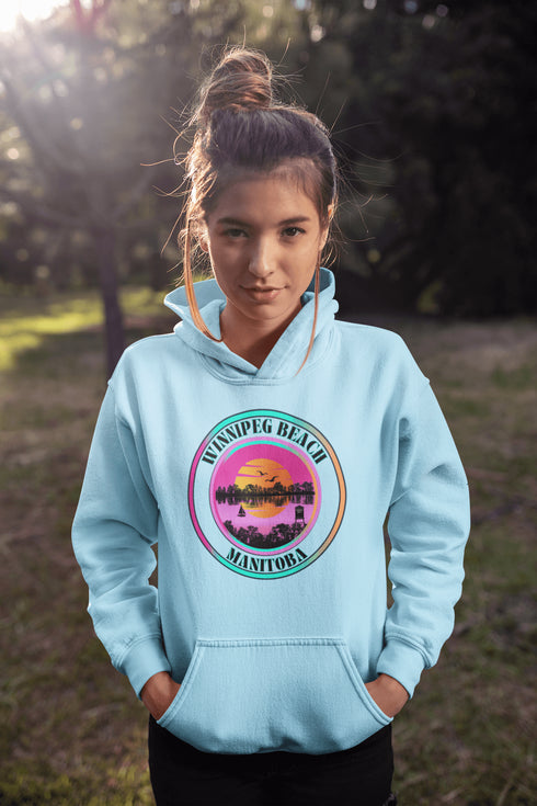 Featuring a dreamy sunset scene with the iconic Winnipeg Beach water tower standing tall, this hoodie gives you all the feels of a perfect beach day without the sand in your shoes.