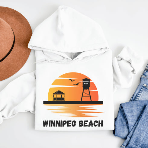 Introducing the "Winnipeg Beach Sunset Hoodie" – because nothing says relaxation like a sunset and a water tower! Whether you're reminiscing about lazy beach days or just need an excuse to wear something cozy, this hoodie captures all the magic of Winnipeg Beach.