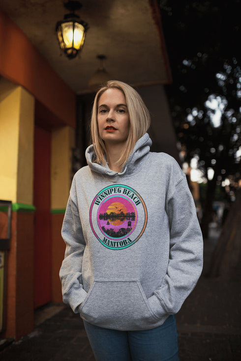 Featuring a dreamy sunset scene with the iconic Winnipeg Beach water tower standing tall, this hoodie gives you all the feels of a perfect beach day without the sand in your shoes.