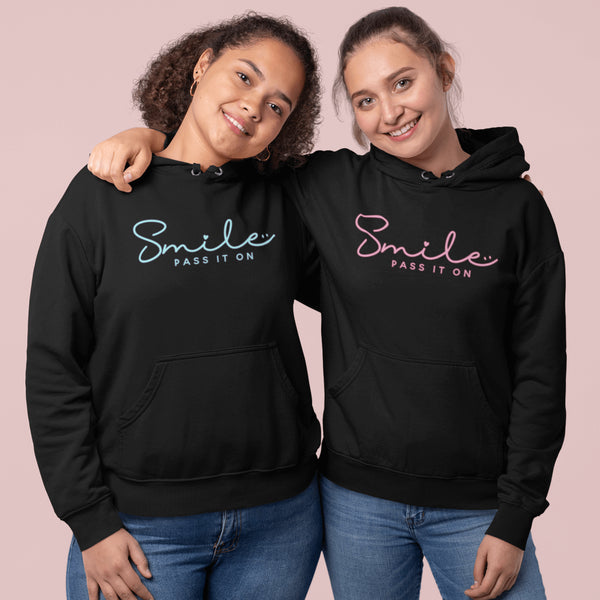 Introducing the latest in wearable cheer technology: the "Smile, Pass It On" Hoodie! This isn't just any ordinary hoodie. Oh no, it's your new best friend, fashion statement, and personal cheerleader all rolled into one cozy package.
