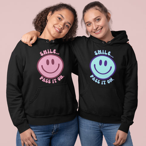 Introducing the ultimate mood booster in fabric form: the "Smile…Pass It On" Happy Face Hoodie! This isn't just any ordinary hoodie; it's a wearable ray of sunshine, guaranteed to spread joy, high-fives, and possibly even spontaneous dance-offs wherever you go.