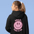 Introducing the latest must-have in your wardrobe that's guaranteed to turn frowns upside down: the Happy Face Hoodie emblazoned with the cheer-spreading command, "Smile...Pass it on." This isn't just any ordinary hoodie; it's your ticket to becoming a walking, talking (and very cozy) ambassador of joy!