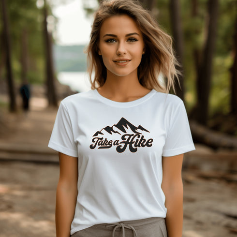 Introducing our rugged and stylish hiking t-shirt, perfect for outdoor enthusiasts and nature lovers alike. Featuring a striking mountain graphic and the motivational slogan "Take A Hike", this shirt is designed to inspire your next camping adventure.