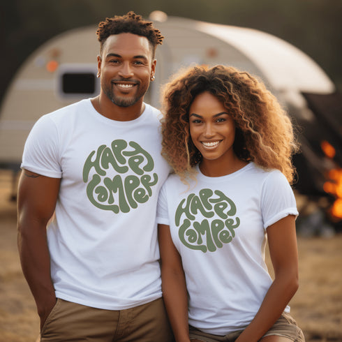 Introducing our Happy Camper Retro Letter Graphic T-Shirt, the perfect addition to your camping wardrobe! Made for outdoor enthusiasts and nature lovers alike, this t-shirt combines style and comfort for your next camping adventure.