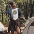 Introducing our Happy Camper Retro Letter Graphic T-Shirt, the perfect addition to your camping wardrobe! Made for outdoor enthusiasts and nature lovers alike, this t-shirt combines style and comfort for your next camping adventure.
