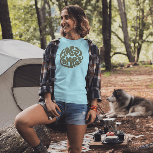 Introducing our Happy Camper Retro Letter Graphic T-Shirt, the perfect addition to your camping wardrobe! Made for outdoor enthusiasts and nature lovers alike, this t-shirt combines style and comfort for your next camping adventure.