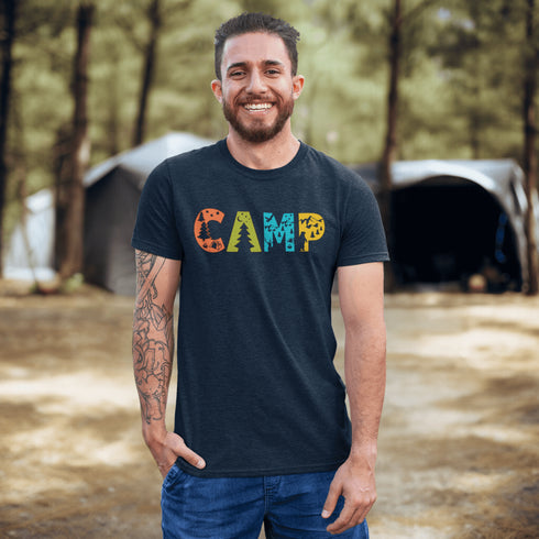Introducing our vibrant and adventurous camping t-shirt! Featuring bold and colorful "Camp" letters adorned with charming camping icons cut out, this shirt is perfect for outdoor enthusiasts and nature lovers alike.