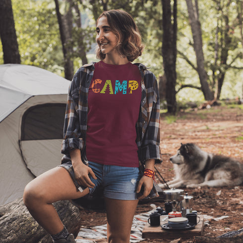 Introducing our vibrant and adventurous camping t-shirt! Featuring bold and colorful "Camp" letters adorned with charming camping icons cut out, this shirt is perfect for outdoor enthusiasts and nature lovers alike.