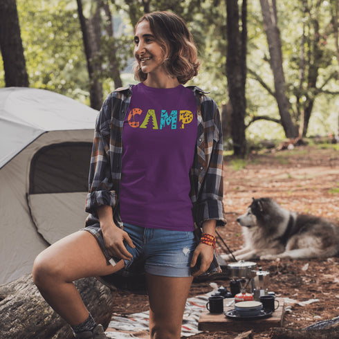 Introducing our vibrant and adventurous camping t-shirt! Featuring bold and colorful "Camp" letters adorned with charming camping icons cut out, this shirt is perfect for outdoor enthusiasts and nature lovers alike.