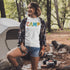 Introducing our vibrant and adventurous camping t-shirt! Featuring bold and colorful "Camp" letters adorned with charming camping icons cut out, this shirt is perfect for outdoor enthusiasts and nature lovers alike.