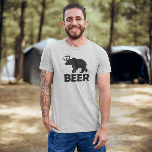 Introducing the ultimate camping fashion statement - the BEER t-shirt! Picture this: a bear with deer antlers, because why not mix things up in the wild? This shirt screams "I love nature... and a good brew!"