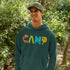 Introducing our vibrant and adventurous camping hoodie! Featuring bold and colorful "Camp" letters adorned with charming camping icons cut out, this shirt is perfect for outdoor enthusiasts and nature lovers alike.