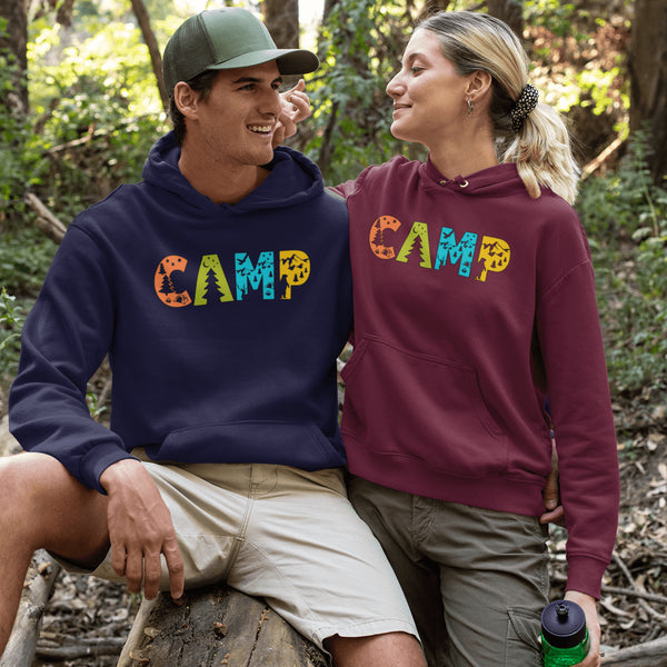 Introducing our vibrant and adventurous camping hoodie! Featuring bold and colorful "Camp" letters adorned with charming camping icons cut out, this shirt is perfect for outdoor enthusiasts and nature lovers alike.