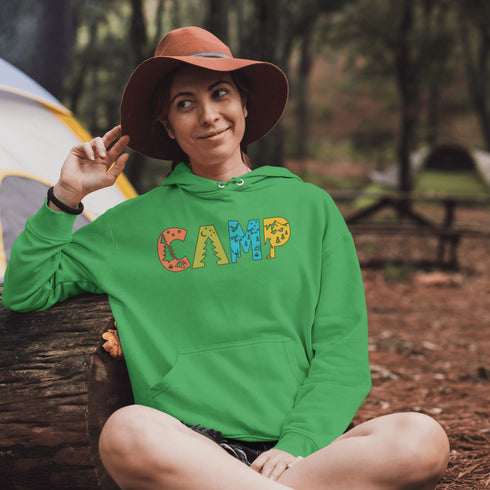 Introducing our vibrant and adventurous camping hoodie! Featuring bold and colorful "Camp" letters adorned with charming camping icons cut out, this shirt is perfect for outdoor enthusiasts and nature lovers alike.
