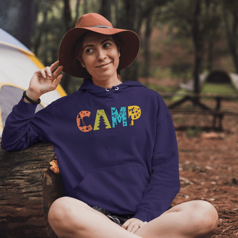 Introducing our vibrant and adventurous camping hoodie! Featuring bold and colorful "Camp" letters adorned with charming camping icons cut out, this shirt is perfect for outdoor enthusiasts and nature lovers alike.