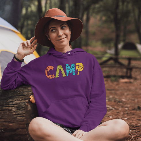 Introducing our vibrant and adventurous camping hoodie! Featuring bold and colorful "Camp" letters adorned with charming camping icons cut out, this shirt is perfect for outdoor enthusiasts and nature lovers alike.