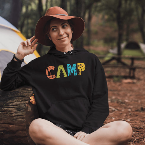 Introducing our vibrant and adventurous camping hoodie! Featuring bold and colorful "Camp" letters adorned with charming camping icons cut out, this shirt is perfect for outdoor enthusiasts and nature lovers alike.