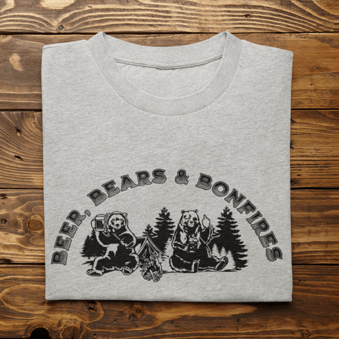 Introducing our hilarious "Beer, Bears & Bonfires" t-shirt! Picture this: a couple of camping bears enjoying a cold one in the woods, gathered around a crackling bonfire. These fun-loving bears know how to have a good time, and now you can join in on the fun too!
