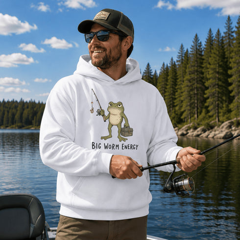 Unisex heavy blend hoodie featuring a funny frog fishing graphic and humorous Big Worm Energy design shown in various lifestyle mockups and outdoor settings.