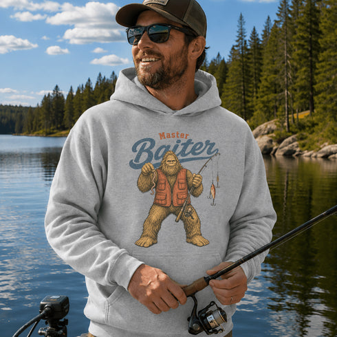 Funny Sasquatch fishing graphic printed on a unisex hoodie featuring a vintage Bigfoot fisherman design, shown on multiple hoodie colors and lifestyle mockups perfect for outdoor and fishing apparel.