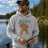 Funny Sasquatch fishing graphic printed on a unisex hoodie featuring a vintage Bigfoot fisherman design, shown on multiple hoodie colors and lifestyle mockups perfect for outdoor and fishing apparel.