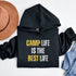 Introducing the ultimate Camping Hoodie for all you wilderness aficionados who believe that "Camp Life Is The Best Life" - because let's be honest, nothing beats the smell of pine trees in the morning, or the thrill of discovering that your tent is still waterproof after a surprise midnight downpour.