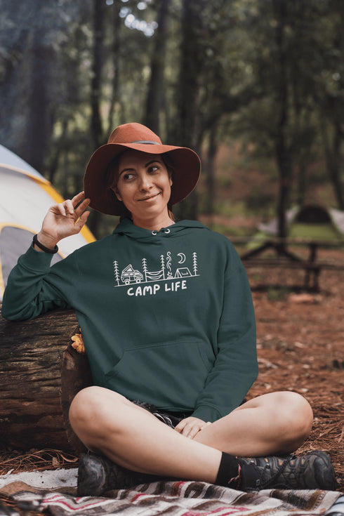 Introducing the ultimate companion for your outdoor adventures: the Camp Life Hoodie. Designed for those who find solace under the stars and joy by the campfire, this hoodie encapsulates the essence of camping. Featuring a picturesque camping scene that speaks directly to the heart of outdoor enthusiasts