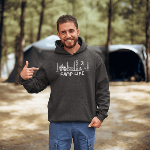 Introducing the ultimate companion for your outdoor adventures: the Camp Life Hoodie. Designed for those who find solace under the stars and joy by the campfire, this hoodie encapsulates the essence of camping. Featuring a picturesque camping scene that speaks directly to the heart of outdoor enthusiasts
