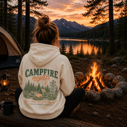 Vintage-inspired outdoor hoodie featuring a matching left chest graphic and large camping-themed back graphic, displayed in a lifestyle mockup inspired by campfires, camping, hiking, and outdoor adventures.