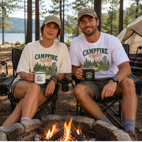 Vintage Campfire Nights camping graphic t-shirt featuring a retro forest campsite with a glowing campfire, tent, pine trees, and outdoor adventure design.
