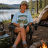 Vintage Campfire Nights camping graphic t-shirt featuring a retro forest campsite with a glowing campfire, tent, pine trees, and outdoor adventure design.