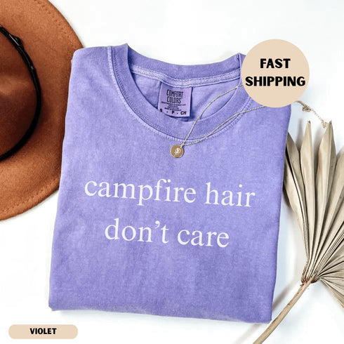 Funny Campfire Hair Don’t Care camping shirt for women. Cute graphic tee for RV trips, glamping, and outdoor adventures. Perfect gift for happy campers.