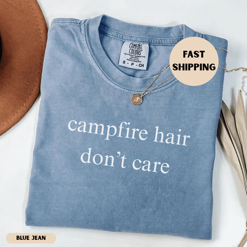 Funny Campfire Hair Don’t Care camping shirt for women. Cute graphic tee for RV trips, glamping, and outdoor adventures. Perfect gift for happy campers.