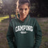 Introducing the "Camping Crew" Hoodie: the ultimate attire for those who believe that a little dirt never hurt anyone and that the great outdoors is merely an extension of their living room.