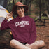 Introducing the "Camping Crew" Hoodie: the ultimate attire for those who believe that a little dirt never hurt anyone and that the great outdoors is merely an extension of their living room.