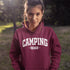 Introducing the "Camping Crew" Hoodie: the ultimate attire for those who believe that a little dirt never hurt anyone and that the great outdoors is merely an extension of their living room.