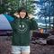 Introducing the latest in outdoor fashion and forest friendliness: the "Tree-mendous Smiles Hoodie"! This isn't just any hoodie; it's your ticket to becoming the most smiley face in the wild. With a dazzling happy face emblazoned on the front, you're set to spread joy among the trees, the birds, and even the most stubborn of rocks.