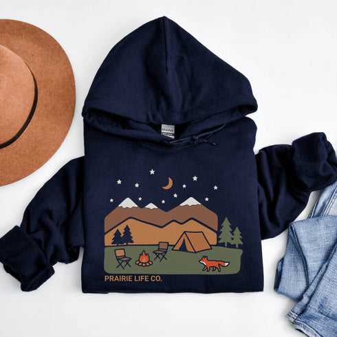 Inspired by peaceful nights under the stars and the quiet magic of the outdoors, the Camping Fox Hoodie captures everything we love about life beyond the city.