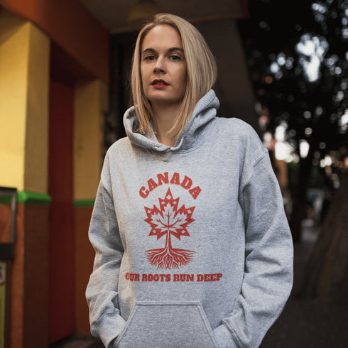 This beautifully designed hoodie features a majestic tree with deep roots, its leaves formed by the iconic Canadian maple leaf.
