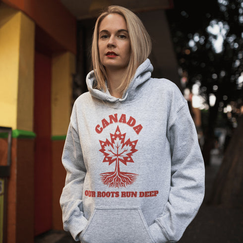 This beautifully designed hoodie features a majestic tree with deep roots, its leaves formed by the iconic Canadian maple leaf.